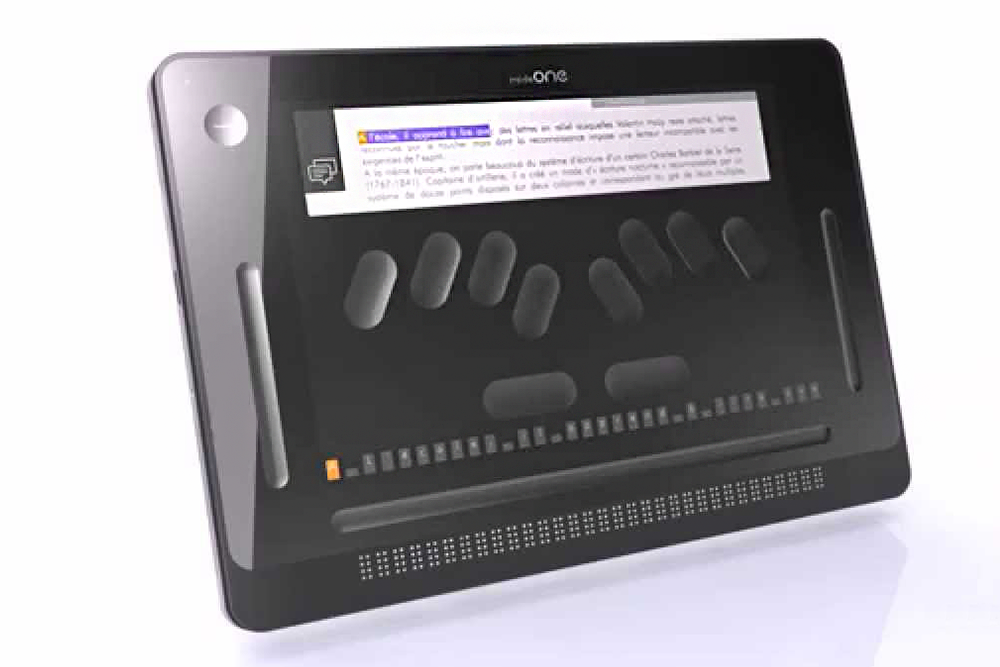 Braille display device with screen and braille text on a white background